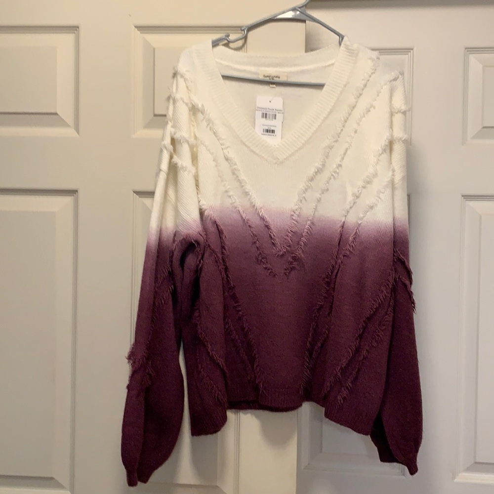 Distressed sweater